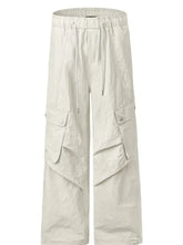 Mens wide leg cargo pants with drawstring waist and flap pockets