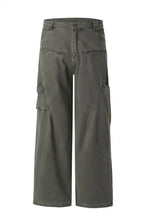 Mens wide leg cargo pants in dark olive green with multiple pockets