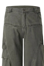 Mens wide leg cargo pants in dark green with button closure and multiple pockets