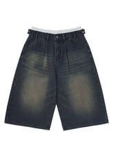 Dark-wash wide leg cropped denim shorts with striped waistband and button closures for men