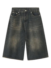 Mens wide leg denim shorts in dark wash black with distressed details
