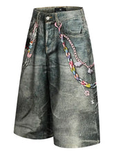 Mens wide leg distressed black denim shorts with chains and charms