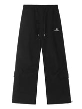 Mens wide leg drawstring pants in black with adjustable waist