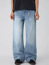 Men’s wide leg jeans in light-wash denim with a relaxed fit and subtle fading for casual wear