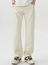 Men’s wide leg jeans in cream-colored denim with a relaxed fit and straight-leg design
