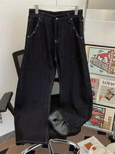 Men’s wide leg jeans black denim pants with silver rivets and contrasting gray inner lining