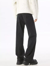 Men wide leg black denim jeans with relaxed fit and subtle stitching details for comfortable casual wear