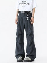 Men’s dark gray wide leg cargo pants with multiple pockets and a studded belt for a stylish leg cargo look