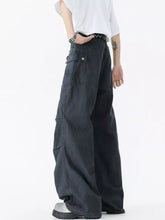 Men’s dark gray wide leg cargo pants with multiple pockets and a relaxed oversized fit for casual wear