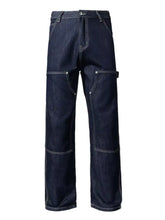 Men’s dark indigo wide leg jeans made of denim with reinforced patches and contrasting stitching