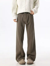 Men wide leg jeans in khaki cotton with a loose fit and black leather belt buckle detail