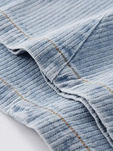 Men’s wide leg jeans in light-wash denim with subtle ribbed texture and contrasting tan stitching