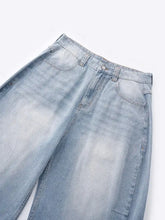 Men’s wide leg jeans in light-wash denim with a relaxed fit and subtle fading for a casual modern look