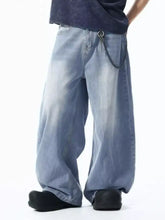Men’s wide leg jeans in light-wash denim with a relaxed fit and subtle vertical ribbing detail