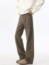 Men wide leg olive green trousers with relaxed fit and subtle side seam detailing in wide leg denim style