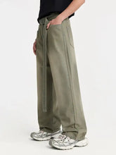 Men’s wide leg jeans in olive green with drawstring waistband and side pockets for comfortable casual wear