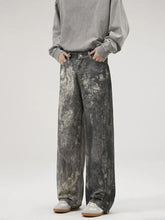 Mens wide leg jeans featuring wide-leg denim pants with a distressed gray and white marbled pattern
