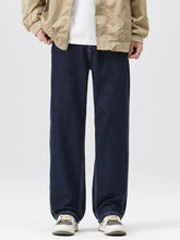 Men’s wide leg jeans in dark indigo denim with straight leg cut and contrasting light blue stitching
