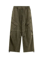 Mens wide leg pants in olive green with drawstring waist and ankle adjusters
