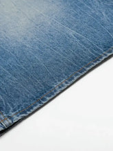 Mens wide leg relaxed fit denim shorts in light blue with distressing