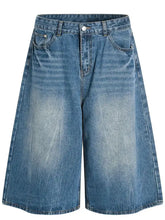 Mens wide leg relaxed fit denim shorts in light blue distressed denim