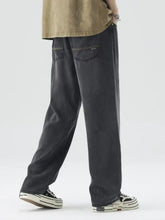 Men’s wide-leg relaxed fit dark gray denim jeans with subtle fading and a comfortable relaxed fit