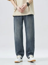 Men’s dark-wash denim relaxed fit jeans with a wide leg and straight-leg cut for comfortable fit jeans style