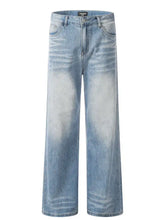 Men’s light-wash denim wide leg wash jeans featuring a wide-leg cut and subtle fading patterns