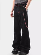 Men’s black wide leg wash jeans with red stitching and silver chain detail on side pocket in denim material