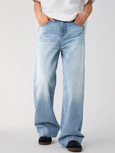 Men’s wide leg wash jeans in light-wash denim featuring a straight-cut wide leg silhouette for casual wear
