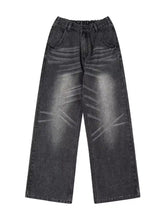 Men’s wide leg washed jeans in dark gray denim with a faded distressed look and elastic waistband