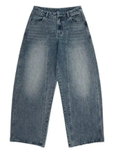 Men’s high-waisted wide leg denim jeans in faded blue wash with subtle whiskering and stitching details