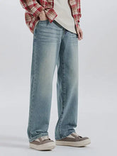 Men’s light-wash denim wide leg jeans with a relaxed straight-leg cut in durable cotton material