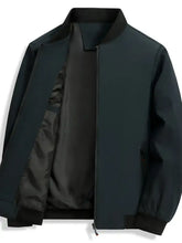 Men’s dark green long sleeve jacket with black collar and cuffs featuring zippered front and side pockets