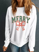 White long-sleeved graphic sweatshirt with merry bow christmas design in green and red, machine wash safe