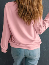 Merry & bright graphic christmas long sleeve sweatshirt in soft pink with a relaxed fit slightly stretchy fabric machine wash cold tumble dry low