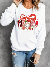 White long sleeve sweatshirt with merry christmas graphic featuring santa face and patterned lettering machine wash cold