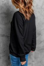 Merry Christmas long sleeve sweatshirt in black with pink leopard print