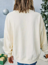 Cream-colored ribbed corduroy sweatshirt with relaxed fit and long sleeves from merry little thing, machine wash cold