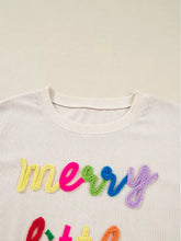 Cozy off-white ribbed knit merry little thing sweatshirt with multicolored crocheted lettering machine wash cold