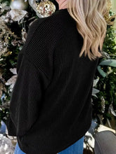 Black corduroy merry round neck christmas sweatshirt with subtle vertical ribbing, machine wash friendly design