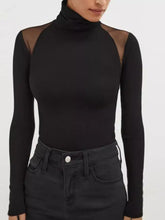 Black mesh shoulder turtleneck bodysuit with sheer mesh panels on the shoulders and long sleeves