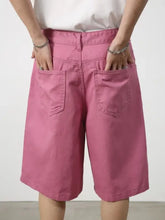 Pink mid rise denim shorts with back pockets, machine wash