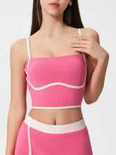 Pink and white striped crop top with contrast trim and detachable chest pads