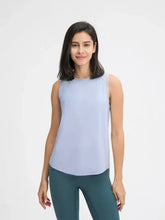 Lavender round neck active tank with cutout back and teal leggings