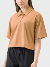 Camel-colored Millennia Half Button Short Sleeve Active T-Shirt with shoulder seam