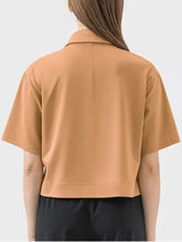 Camel-colored Millennia Half Button Short Sleeve Active T-Shirt with shoulder seam