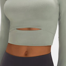 Millennia long sleeve cropped top with sports strap cutout