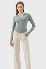 Millennia pocketed zip hooded long sleeve active outerwear in light blue cotton blend