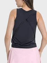 Black Millennia racerback tank top with pink shorts, medium length and bust